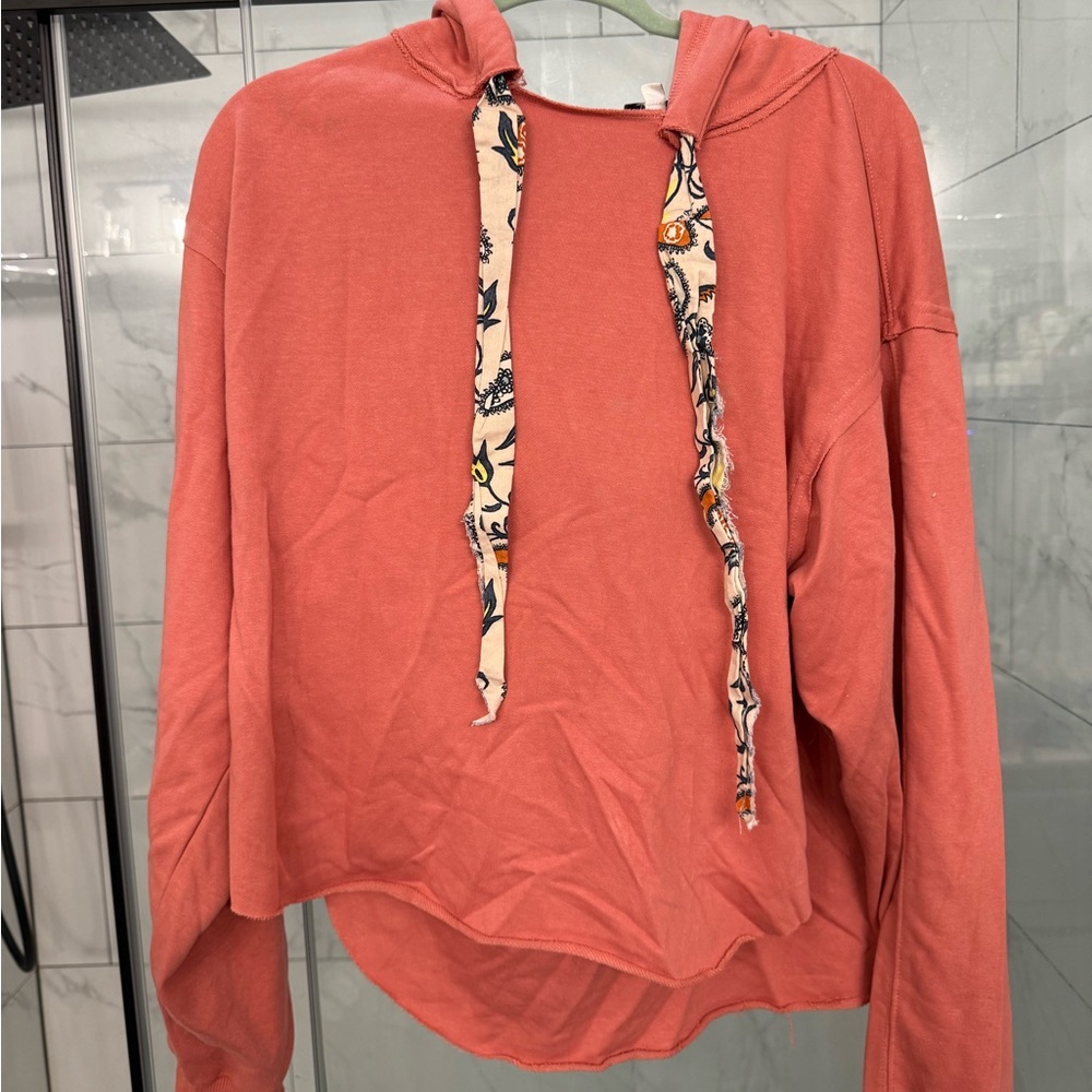 Stylish Coral Hoodie with Patterned Drawstrings